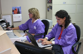 Peggie and Dr. Cook at front desk